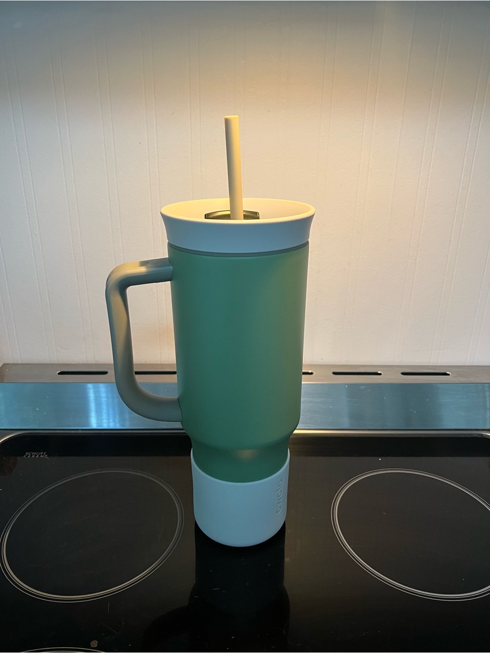 Green Owala Tumbler with Straw and Handle. Never used, comes with rubber boot.